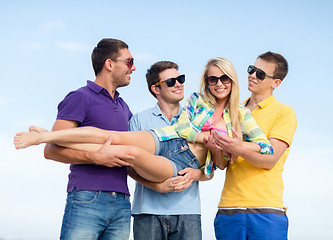 Image showing group of friends having fun on beach
