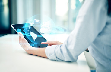 Image showing close up of woman hands with tablet pc at office