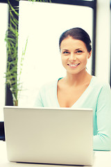 Image showing happy woman with laptop computer