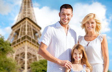 Image showing happy family in paris over eiffel tower background