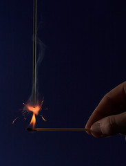 Image showing Hand lighting a sparkler