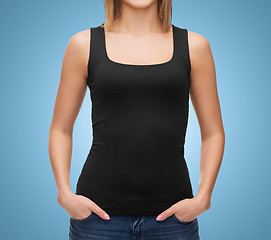 Image showing close up of woman in blank black tank top