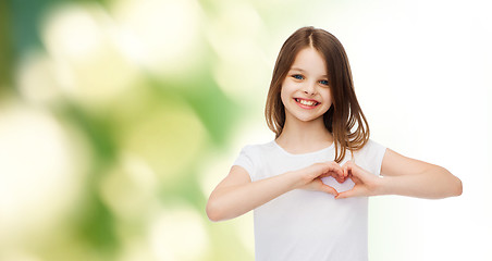 Image showing smiling little girl in white blank t-shirt