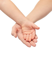 Image showing close up of woman and little child hands together