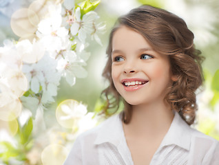 Image showing happy girl over summer garden background