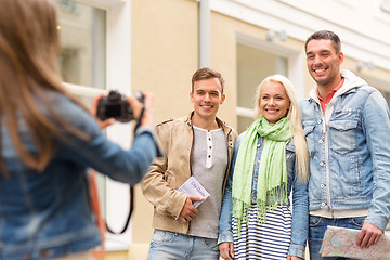 Image showing group of smiling friends taking photo outdoors