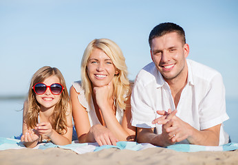 Image showing happy family on the beach