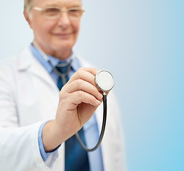 Image showing close up of doctor in white coat with stethoscope