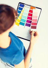 Image showing woman working with color samples for selection