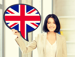 Image showing smiling woman with text bubble of british flag