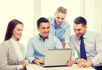 Image showing business team working with laptop in office