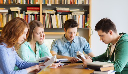 Image showing students with books preparing to exam in library