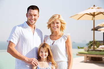 Image showing happy family on summer vacation at resort beach