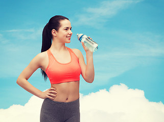 Image showing sporty woman with water bottle