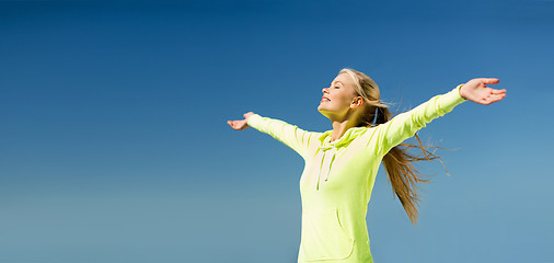 Image showing woman doing sports outdoors