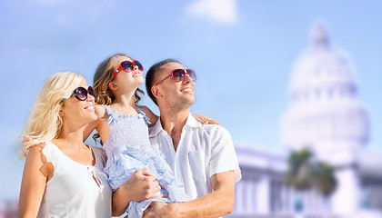 Image showing happy family over american white house background