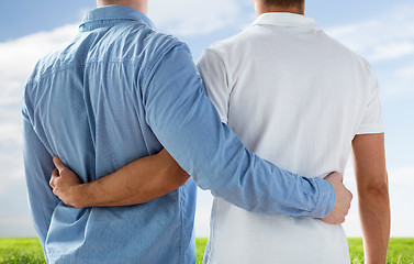 Image showing close up of happy male gay couple hugging