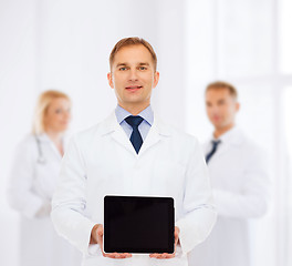 Image showing smiling male doctor with tablet pc