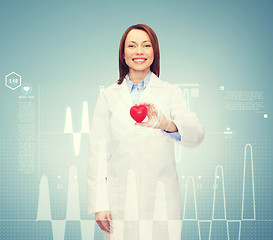 Image showing smiling female doctor with heart