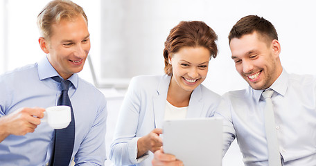 Image showing business team having fun with tablet pc in office