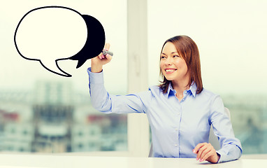 Image showing businesswoman drawing text bubble