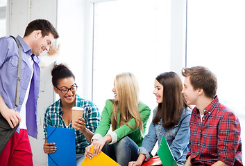 Image showing students communicating and laughing at school