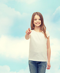 Image showing little girl in blank white t-shirt pointing at you