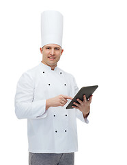 Image showing happy male chef cook holding tablet pc