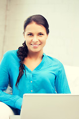 Image showing happy woman with laptop computer