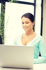 Image showing happy woman with laptop computer