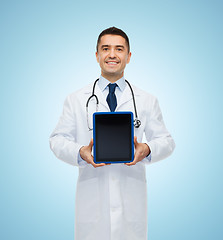 Image showing smiling male doctor with tablet pc