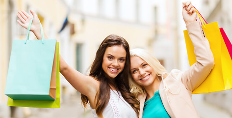 Image showing girls with shopping bags in ctiy