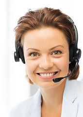 Image showing friendly female helpline operator