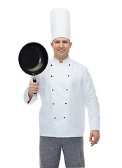 Image showing happy male chef cook holding frying pan