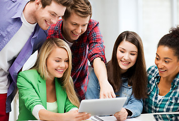 Image showing students looking at tablet pc in lecture at school