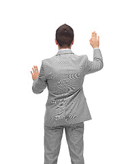 Image showing businessman touching something imaginary