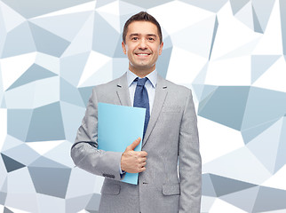 Image showing happy businessman holding folder