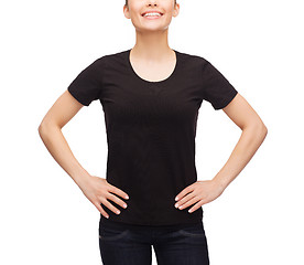 Image showing smiling woman in blank black t-shirt