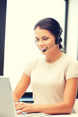 Image showing helpline operator with laptop computer