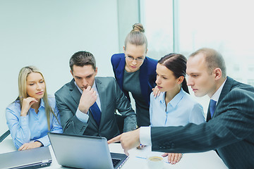 Image showing business team with laptop having discussion