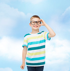 Image showing smiling little boy in eyeglasses