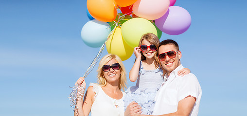 Image showing family with colorful balloons