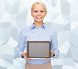 Image showing businesswoman with blank black tablet pc screen