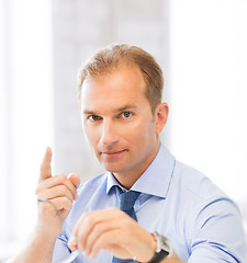 Image showing businessman showing warning gesture