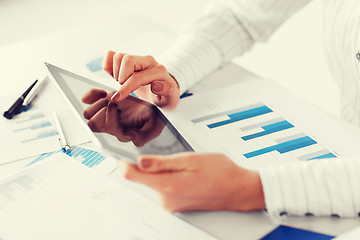 Image showing woman with tablet pc and chart papers