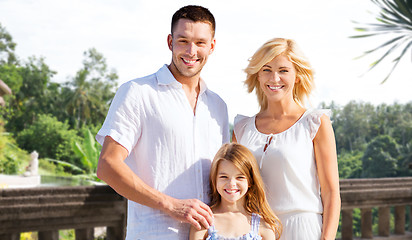 Image showing happy family on summer vacation at resort beach