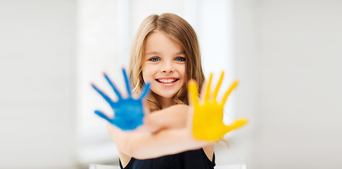 Image showing girl showing painted hands