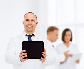 Image showing smiling male doctor with tablet pc