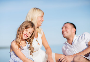 Image showing happy family having a picnic