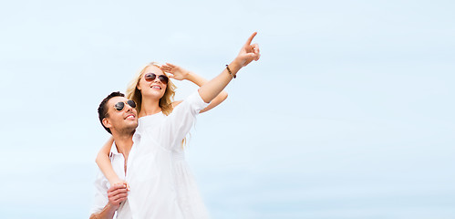 Image showing couple in shades at sea side